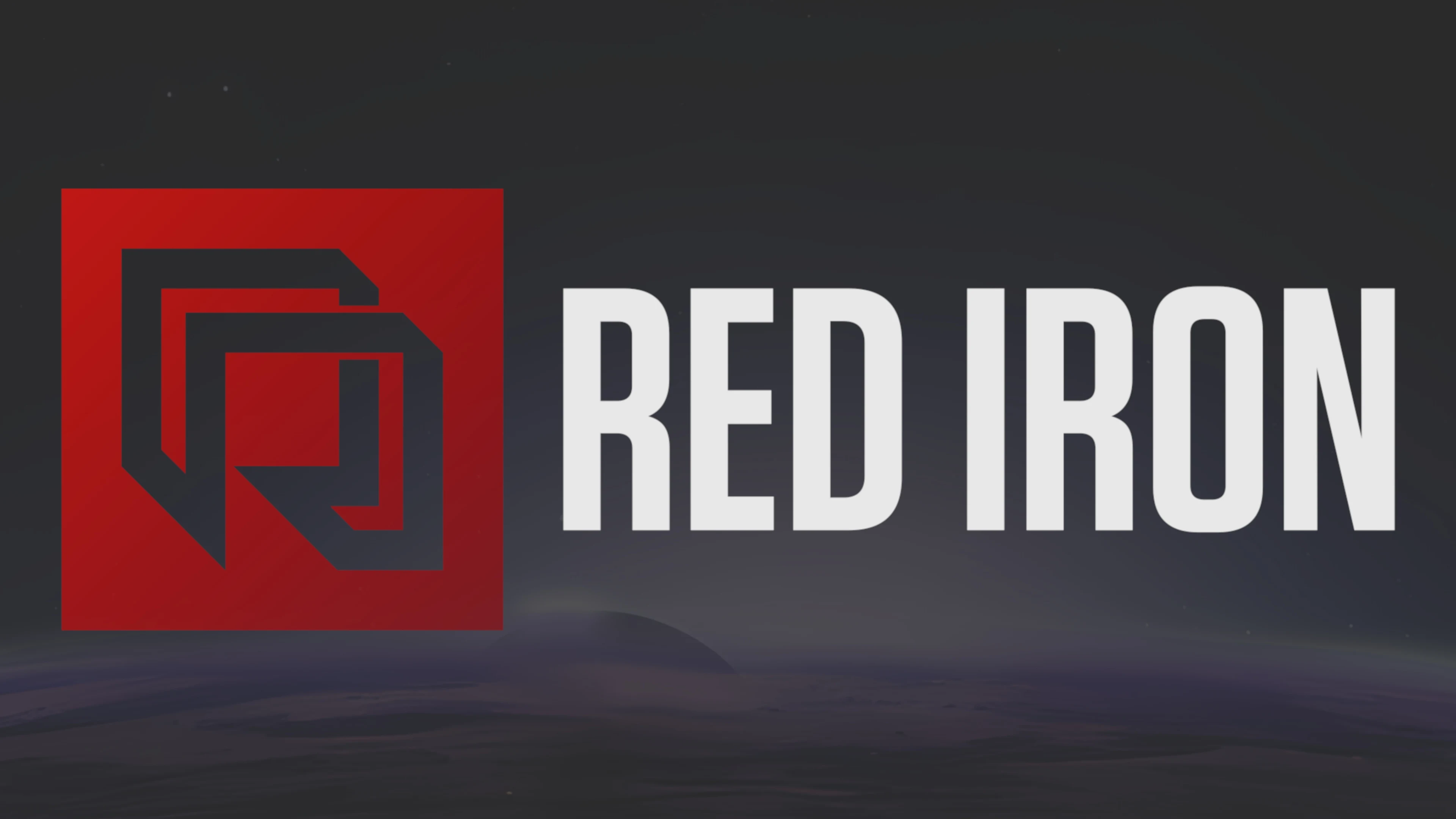 Dark grey background with Red Iron logo. The letters are white and there is a red square icon on the left with 2 black square frames inside it